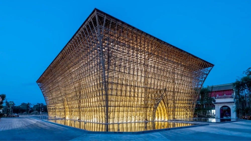 the exterior view of a welcome center made from bamboo