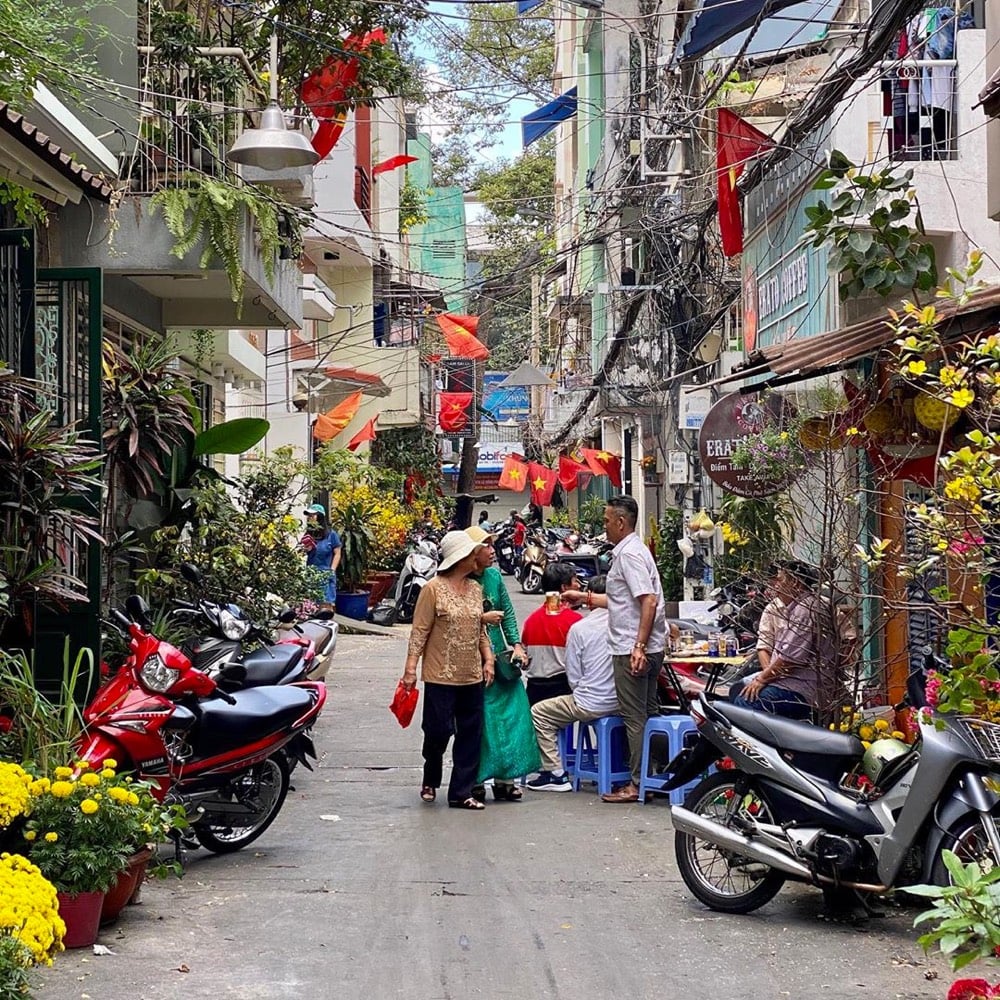 Families celebrating in Saigon on the first day of Tet