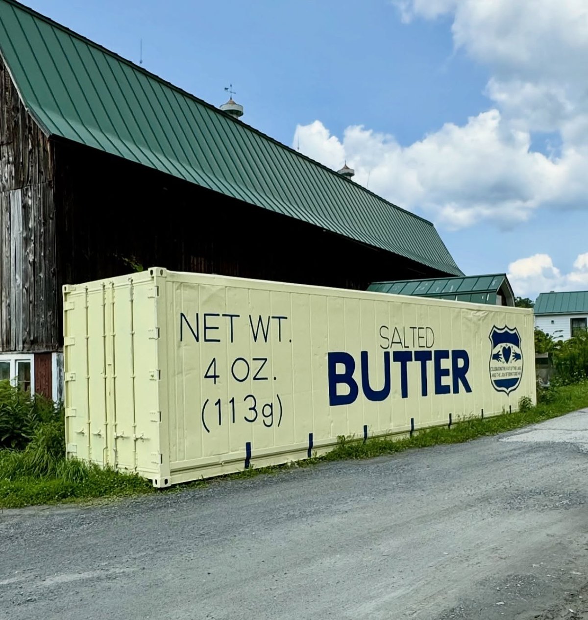 a shipping container painted to look like a stick of butter