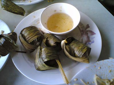 Fried chicken wrapped in pandanus leaves