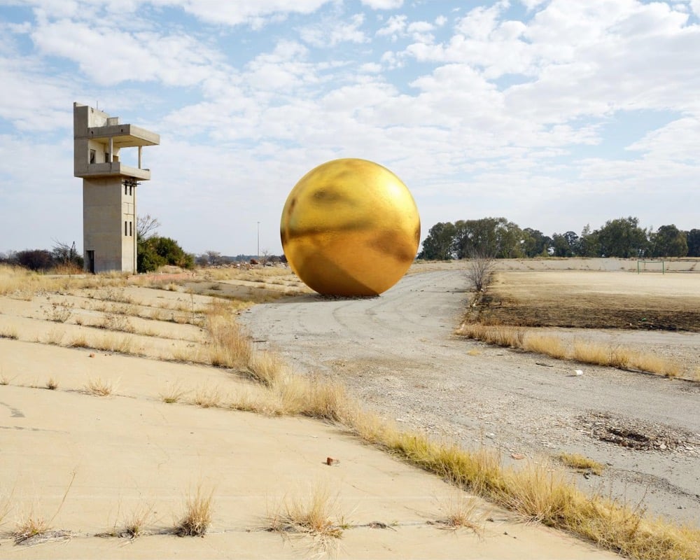 sphere of metal next to a mine