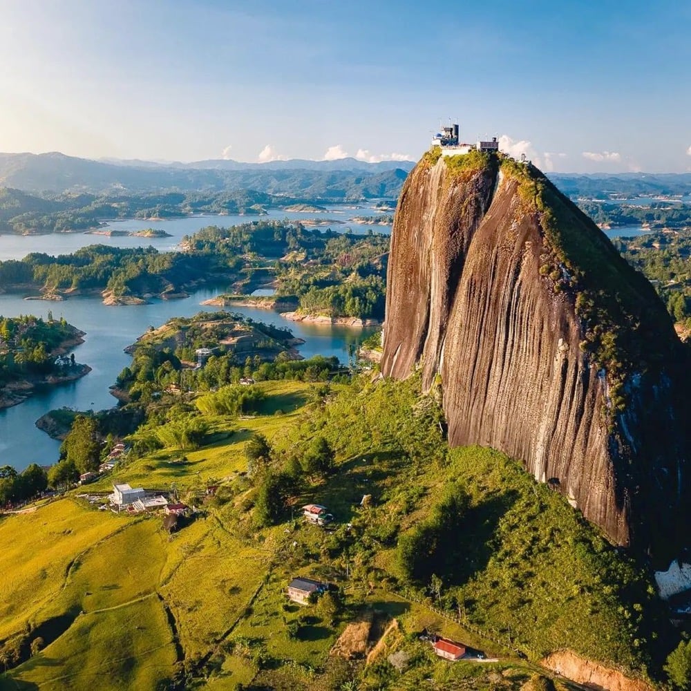 a massive rock juts hundreds of feet out of the Earth