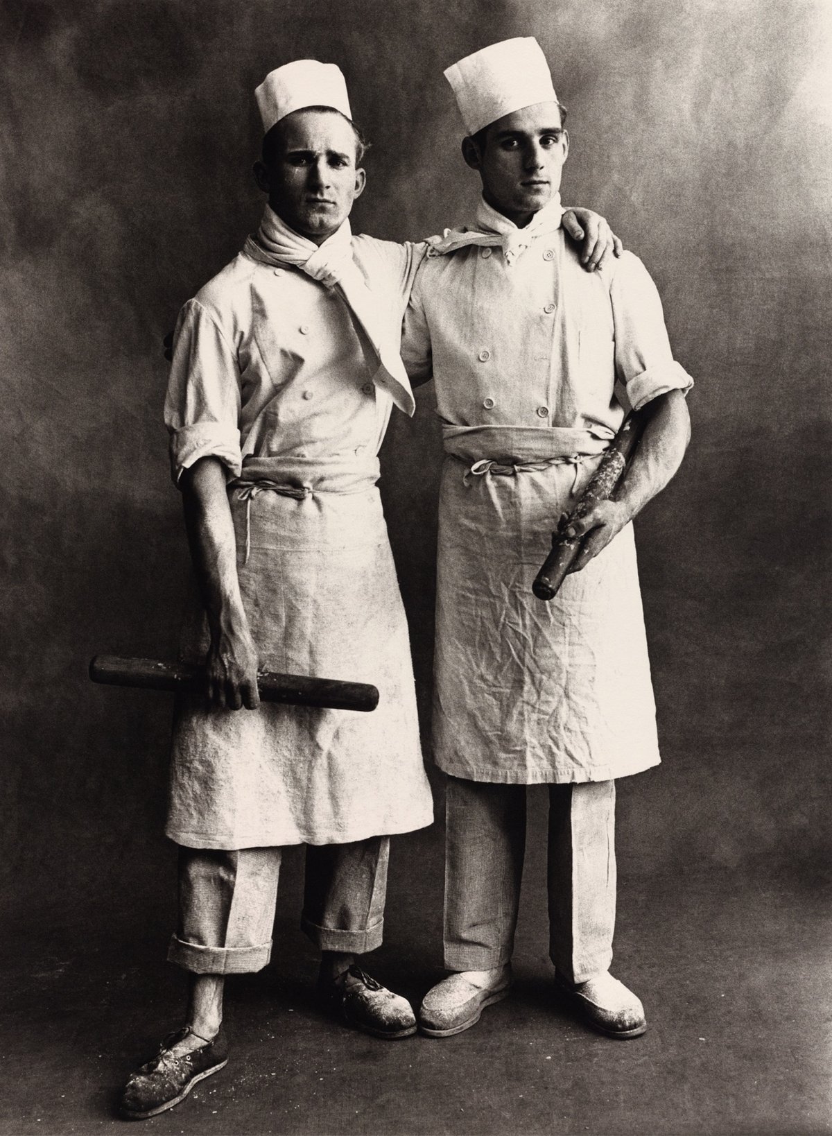 black & white photo of two bakers