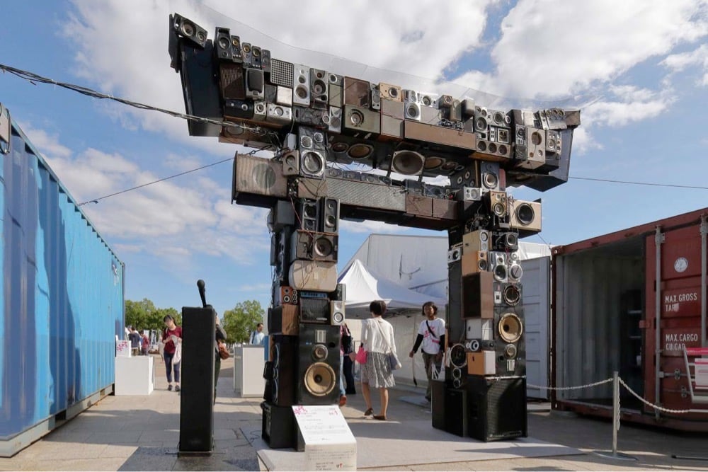 a traditional Japanese torii gate made out of speakers