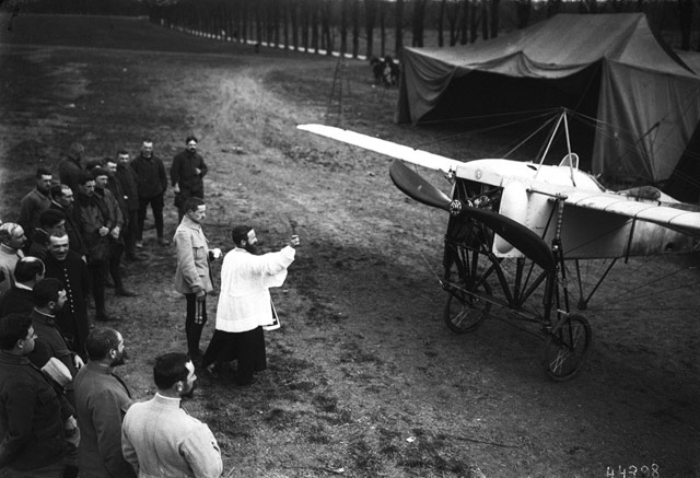 Priest blesses airplane