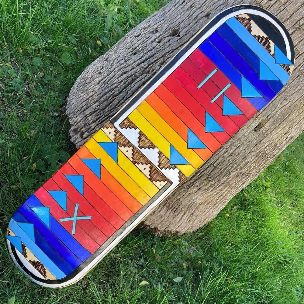 a skateboard deck designed by Di'Orr Greenwood